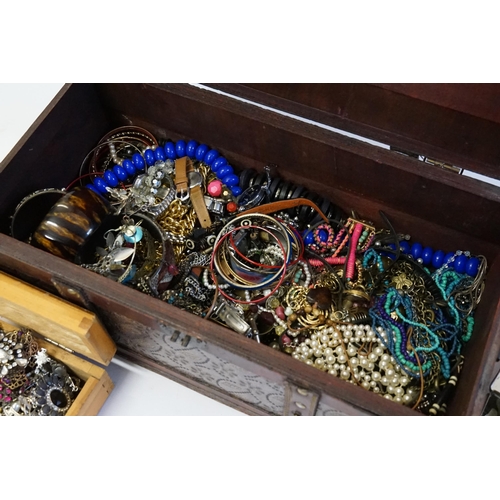 173 - A Leather Bound Travelling Trunk containing of Costume Jewellery to include 1960s Earrings, Bangles,... 