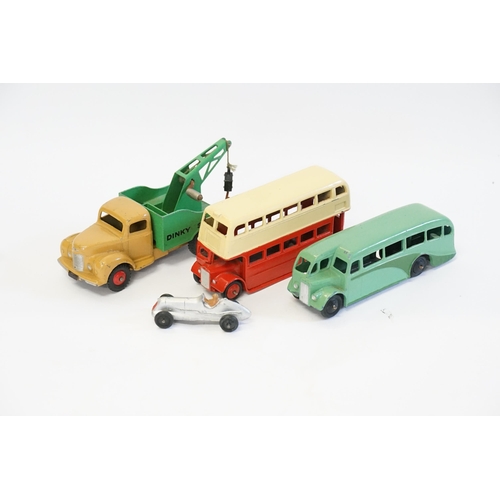 241 - Four Dinky Toys to include a Small Scale Racing Car in Silver, an AEC Bus in Cream over Red, a Dinky... 