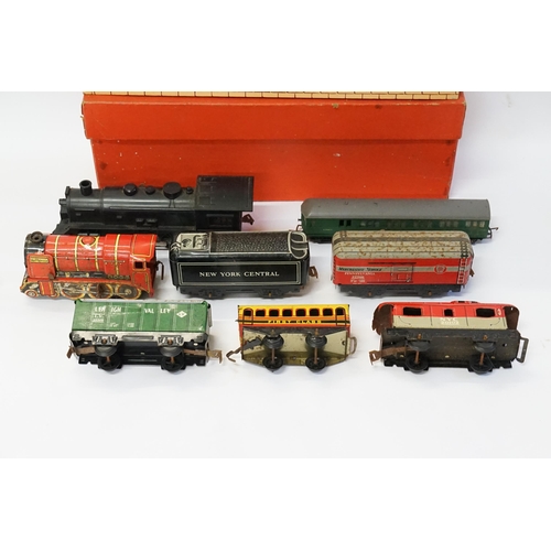 499 - A Collection of Trains to include a Boxed Hornby O Gauge Train Station 