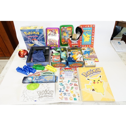 664 - A Collection of Pokemon items to include Original Topps Playing Cards, 23ct Gold Plated Jiggly Puff ... 