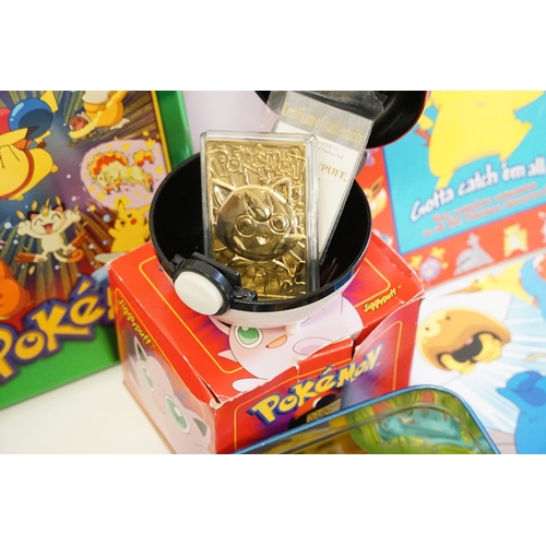 664 - A Collection of Pokemon items to include Original Topps Playing Cards, 23ct Gold Plated Jiggly Puff ... 