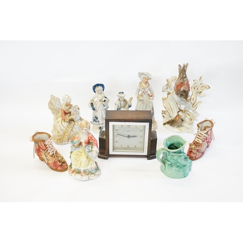 881 - A Collection of modern China Figurines, Toby Jug, Oak Clock, etc.