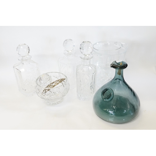 629 - A Crystal Glass Champagne Bucket, three decanters, a Large Rummer, a Rose Bowl & a Soda Glass Bottle... 