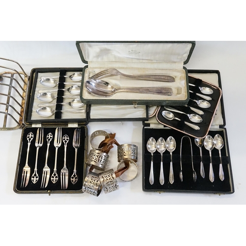 146 - Silver Plated Napkin Rings, Toast Rack, 5 various Silver Plated Cased Cutlery, etc.