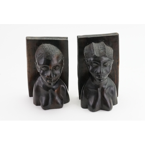 871 - A Pair of Carved Wood African Book Ends.