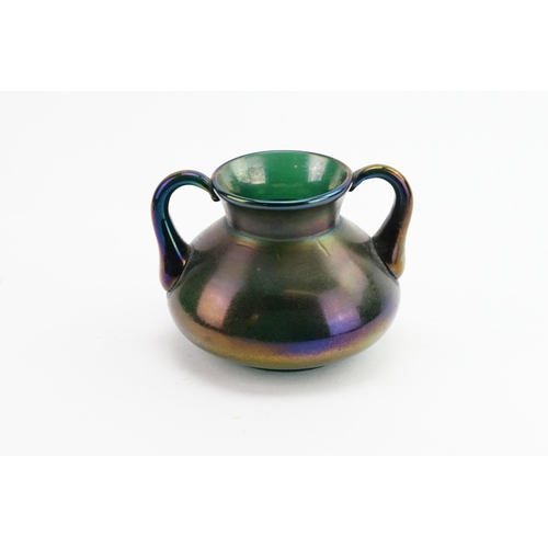 624 - A Webbs Lustre Two Handled Iridescent Glass Vase. Measuring: 12cms High.