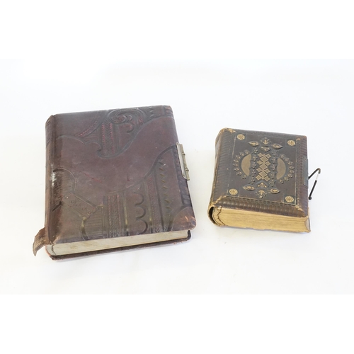 976 - Two Victorian Moroccan covered Photograph Albums containing a collection of Family Photographs.