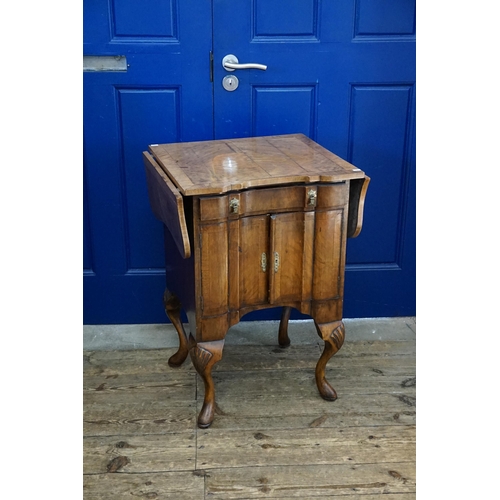 564 - A Walnut veneered Cross Banded Concave Shape Top Night Table fitted a single drawer, cupboards below... 