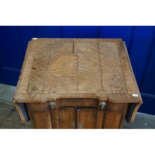 564 - A Walnut veneered Cross Banded Concave Shape Top Night Table fitted a single drawer, cupboards below... 