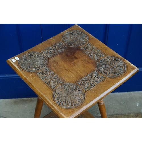 565 - A Late 19th Century Square Chip Carved Table in Chestnut with under tier. Measuring: 43cms across.