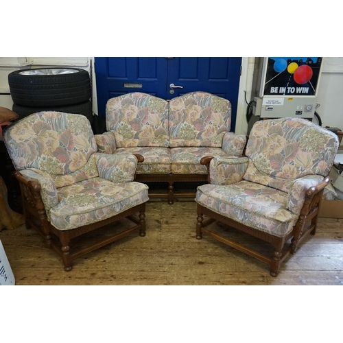 561 - A Modern Ercol Two Seater Settee & Two Easy Chairs with Linen Fold Panel Fronts, Turned Side Columns... 