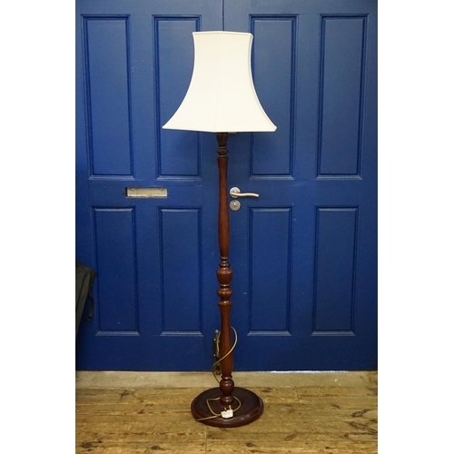 586 - A Turned Wood Standard Lamp with Bulbous Turning & a Shaped Base.