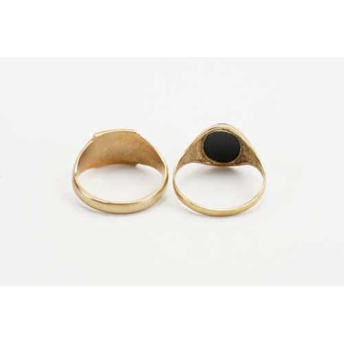 157 - Two 9ct Gold rings. Weight 7.4g. Size V/W.