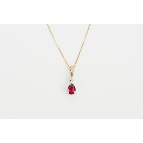 163 - A 9ct Gold Ruby set necklace, set with one pear shaped Ruby and Diamond. Marked K DIA on pendant. Le... 