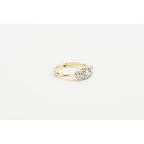 167 - A 18ct Gold & Diamond set ring, set with three larger Diamonds (centre approx 0.10ct, each size appr... 