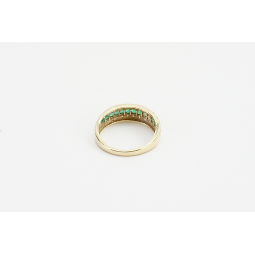 168 - A 9ct Gold Diamond & Emerald set ring. Set with 13 Emeralds and chip Diamonds. Weight 2.5g. Size P.