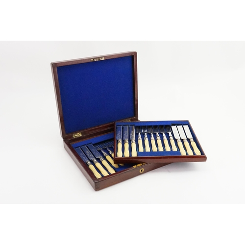 137 - A bone handled plated cutlery set, contained in fitted wooden box.