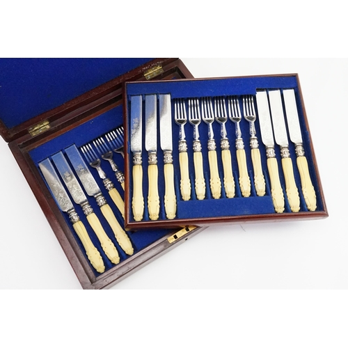 137 - A bone handled plated cutlery set, contained in fitted wooden box.