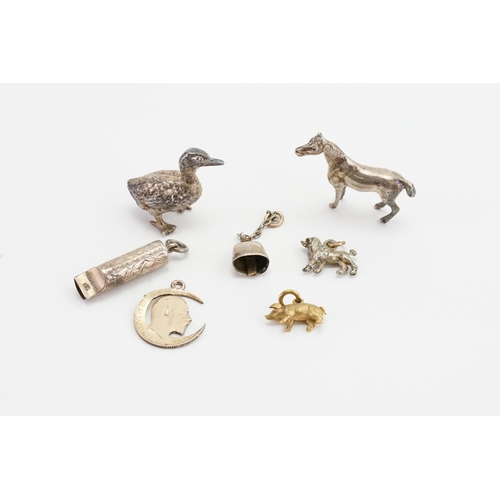 189 - A collection of various charms, to include a Gold coloured pig, Silver horse, Silver duck, and vario... 