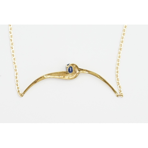 193 - A 18ct yellow gold Sapphire and Diamond set necklace. Sapphire size approx 0.15ct Emerald cut. Weigh... 