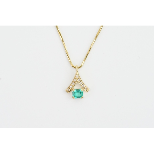 194 - A 18ct Gold (as per insurance valuation) Emerald and Diamond set necklace. Set with 9 Diamonds and a... 