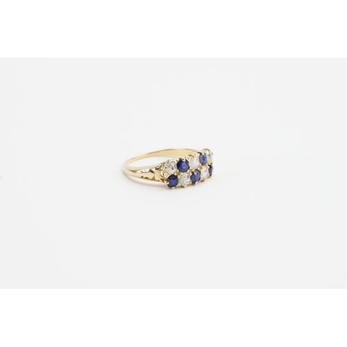 195 - A 18ct Gold Sapphire and Diamond set ring, in rectangular form. Set with five old European cut Diamo... 