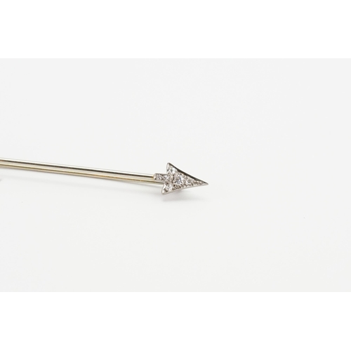 201 - A white gold diamond set arrow brooch (tests as 18ct white gold, as per insurance valuation). The br... 