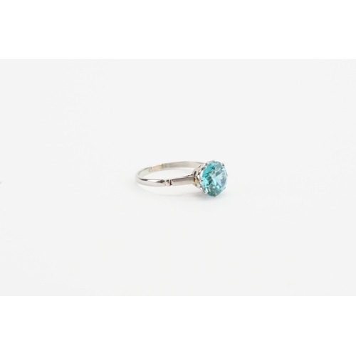 204 - A 18ct white gold ring, set with a brilliant cut intense blue natural zircon. Approx 2ct. Size M. We... 