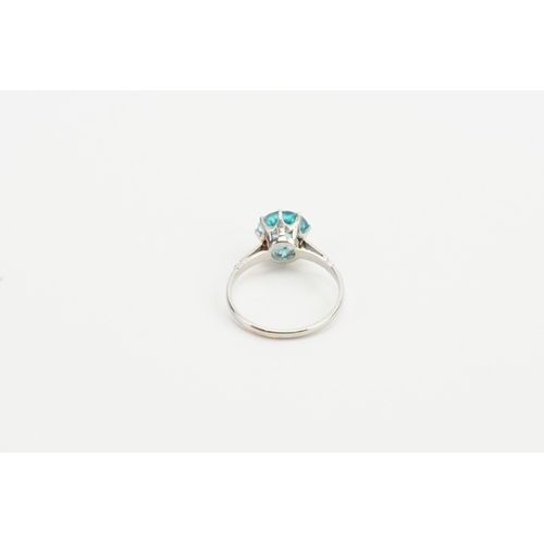 204 - A 18ct white gold ring, set with a brilliant cut intense blue natural zircon. Approx 2ct. Size M. We... 