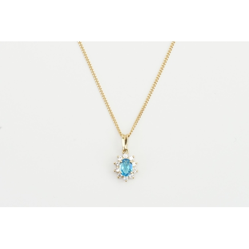 206 - A 9ct gold pendant set with paste and a topaz. Hung on unmarked chain.