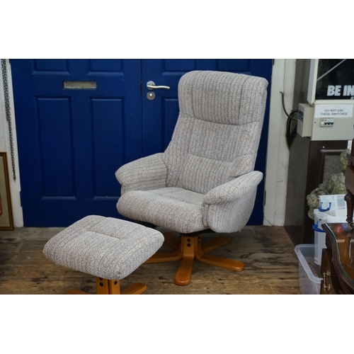 518 - A modern Striped Hooked Tweed Easy Chair with Stool resting on a shaped base.