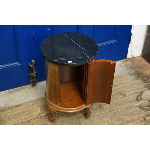 520 - An Antique French Circular marble topped Night Table resting on shaped feet. Measuring: 34cms across... 