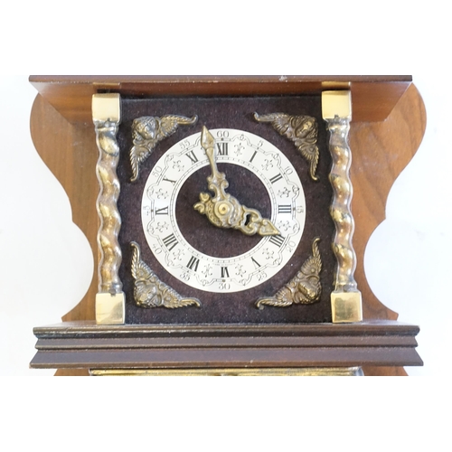 339 - A Reproduction Continental design Wall Clock with Nickle Silver Chaptering, Brass decoration & Weigh... 