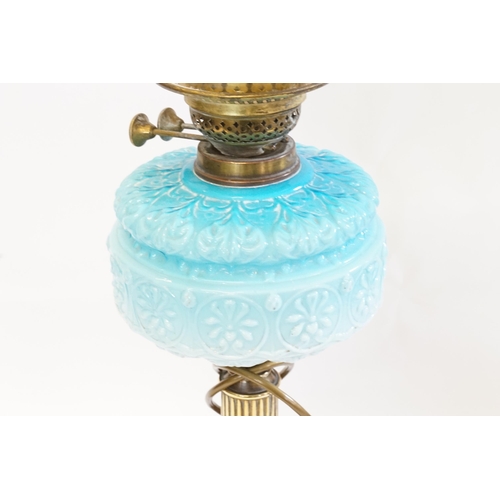 582 - An Art Nouveau Brass & Blue Glass Reservoir Table Lamp with a Frosted Shade on Base & later converte... 