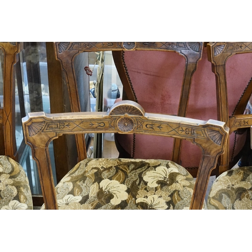 512 - A Set of 6 Aesthetic Period Carved Back Dining Chairs upholstered in Floral Tapestry.