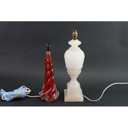 584 - An Alabaster Table Lamp & one other in Red Glass with a swirl pattern.