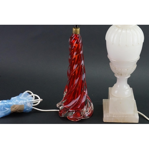 584 - An Alabaster Table Lamp & one other in Red Glass with a swirl pattern.