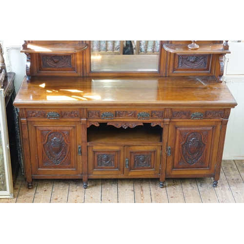 502 - A Victorian Carved Oak & Mirrored Backed Sideboard fitted with End Cupboards, Three Drawers, Cupboar... 