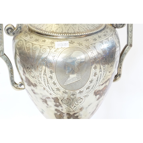 135 - A Victorian Silver Plated Coffee Urn with engraved decoration & standing on a square base with bird'... 