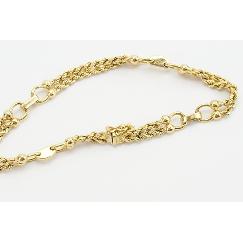 229 - A 18ct yellow gold CPJ marked bracelet, in the double rope design. Weight 15.6g. Length 19.5cm.