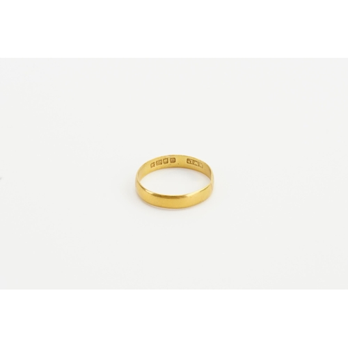 221 - A 22ct gold wedding band. Weight 2.5g. Size P. AF