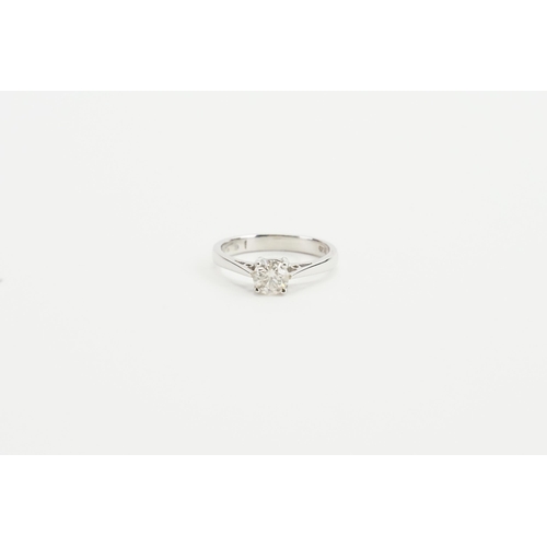 217 - A 18ct white gold 0.15ct diamond set ring, round brilliant cut. Weight 3g. Size K.