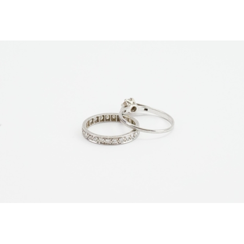 218 - A Platinum set old cut diamond ring, set with a single 0.32ct diamond. Along with a diamond set eter... 