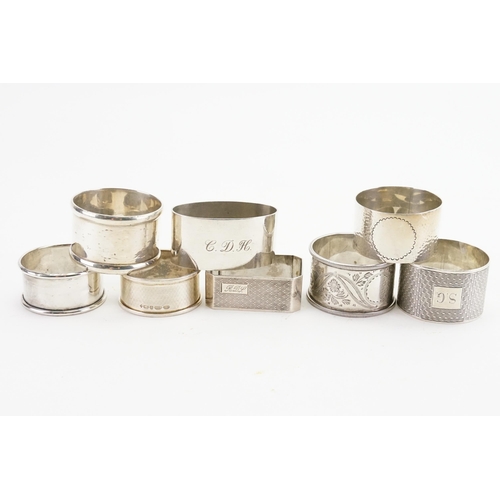 98 - Eight various silver napkin rings, in various designs. Weight 194g.