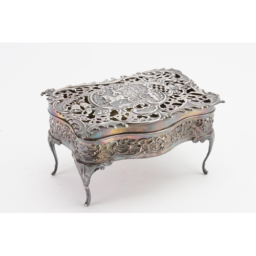 64 - A 1905 William Comyns & Sons silver pierced casket. Depicting a horse and carriage scene. 14.5cm x 1... 