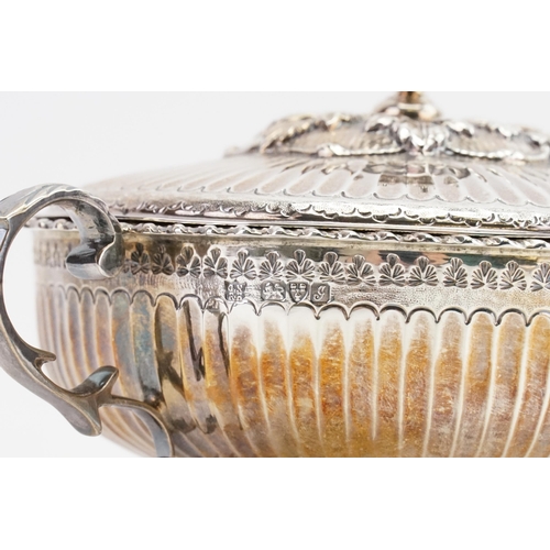 65 - A 1909 George Nathan & Ridley Hayes	Silver porringer. With ribbed decoration . Weight 374g.