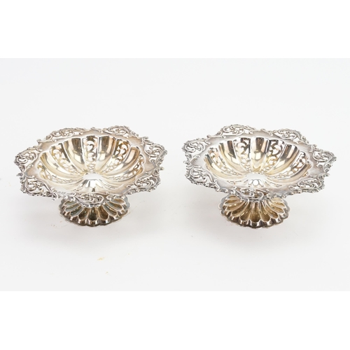 74 - A pair of 1907 Colen Hewer Cheshire pierced bon bon dishes. Weight 120g. One with date letter L & th... 