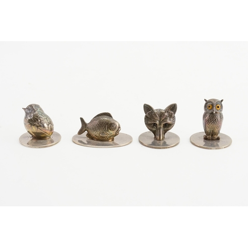 80 - A set of four circa 1900 Sampson Mordan & Co Ltd silver place setting holders. Depicting owl, fox, f... 