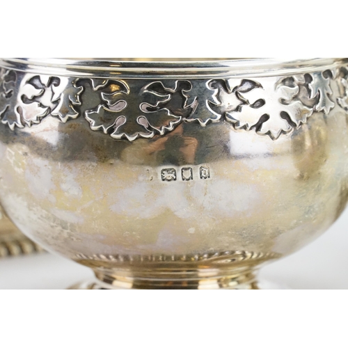 81 - A 1919 Wakely & Wheeler silver tea & coffee service, to include sugar and cream. Decorated with bead... 