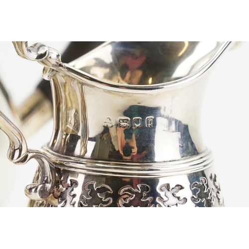 81 - A 1919 Wakely & Wheeler silver tea & coffee service, to include sugar and cream. Decorated with bead... 